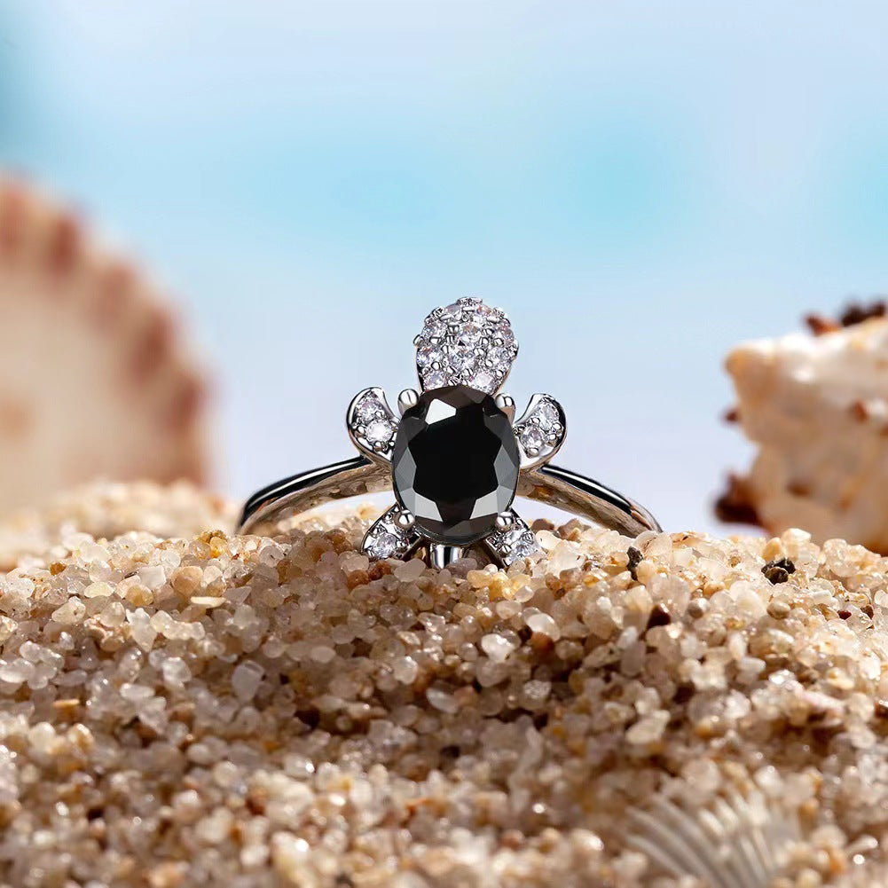 Platinum Ring With A Colored Tortoise Design Featuring Blue Diamondsunisex